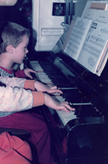 Mendel and brother at the piano (1982)